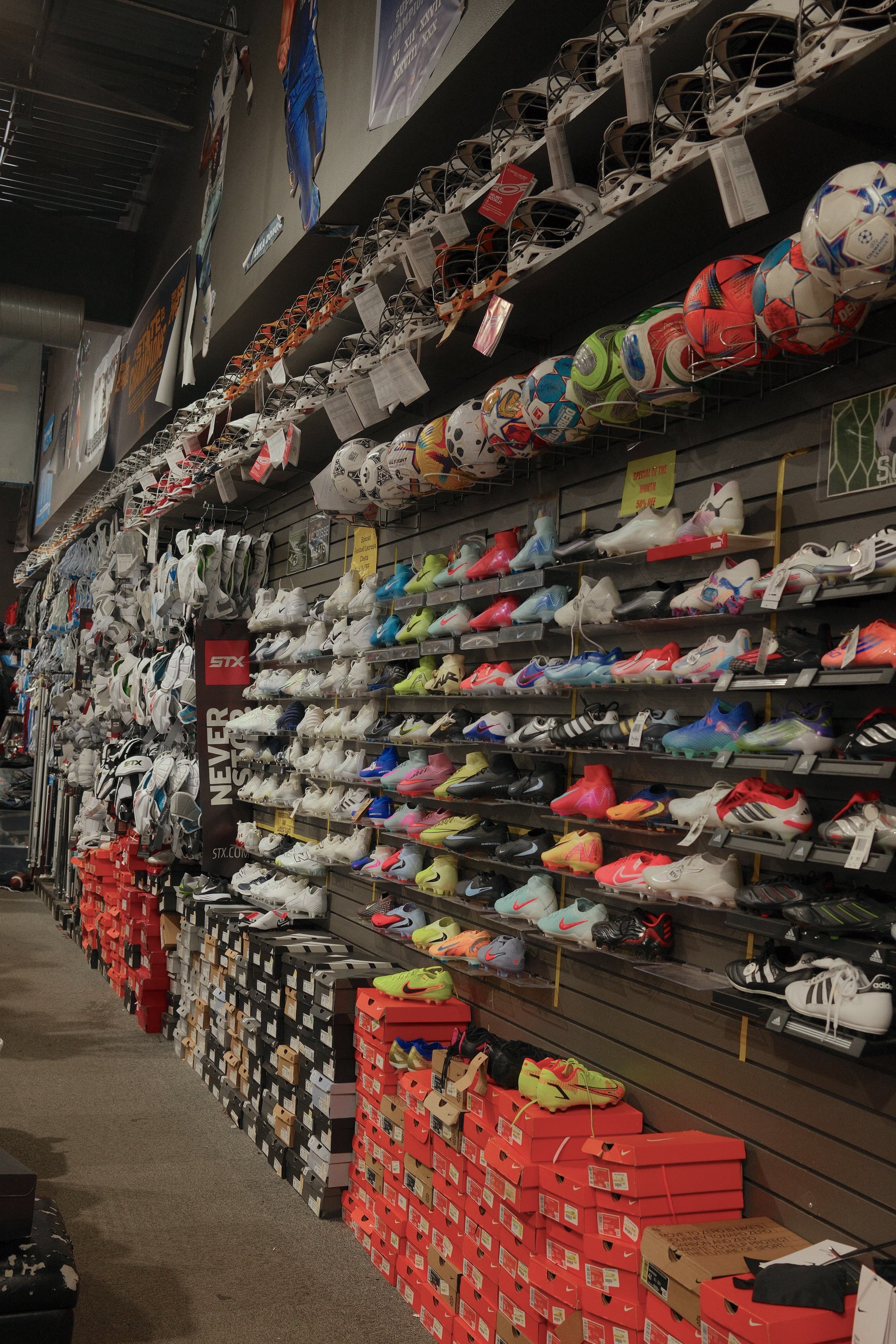 Wall of soccer cleats at Not Just Soccer